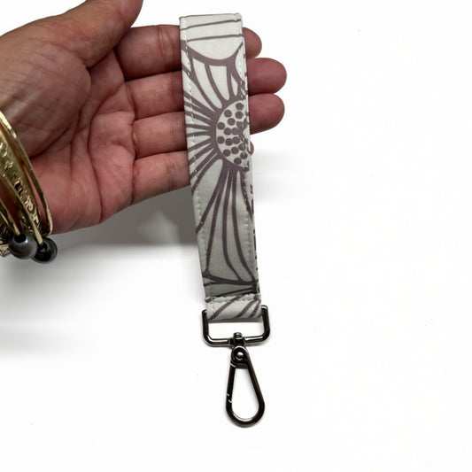 Pua Kala Mauve Wristlet